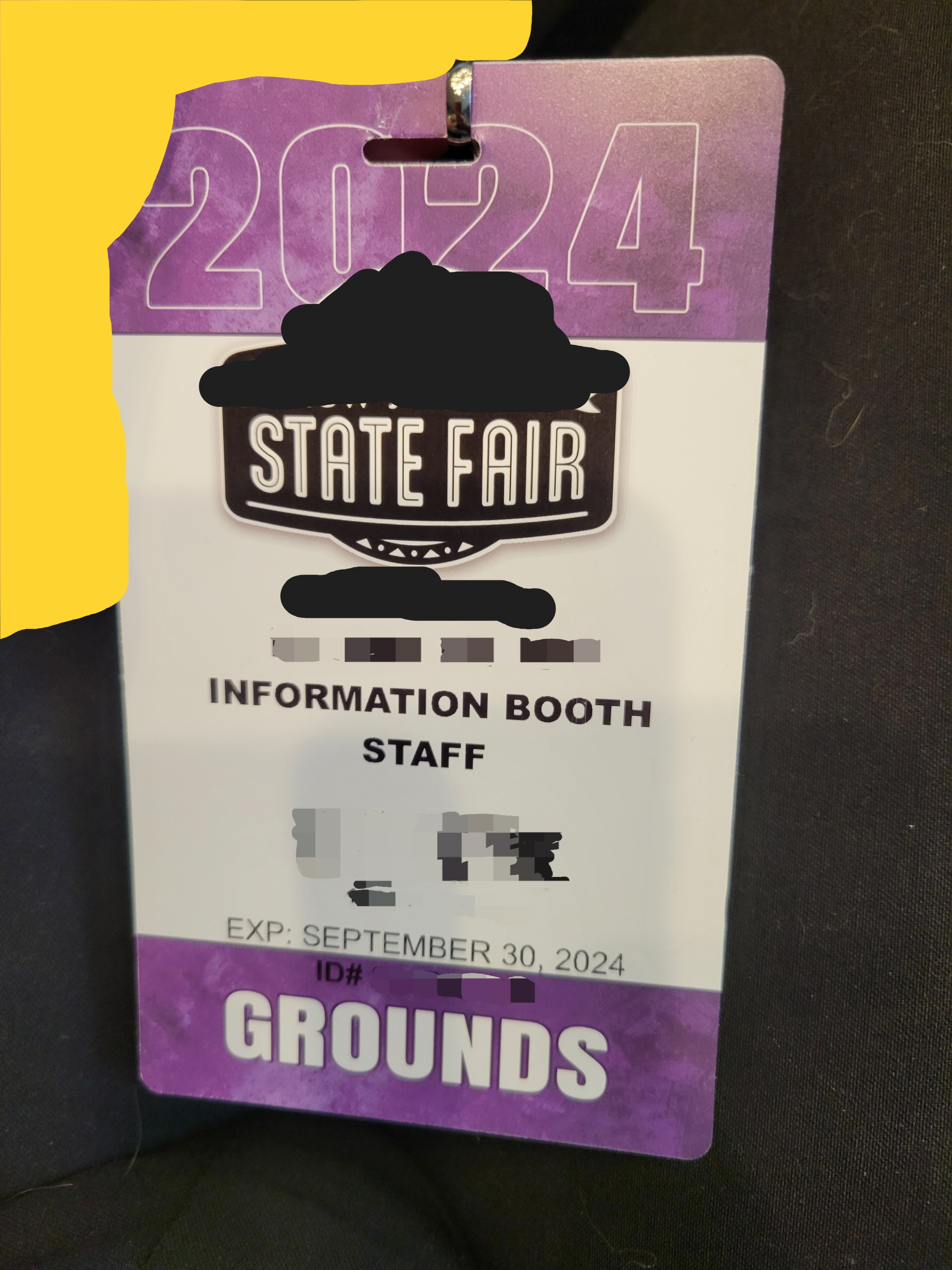 State fair information booth staff badge with the words year 2024, where they work, and when it expires .